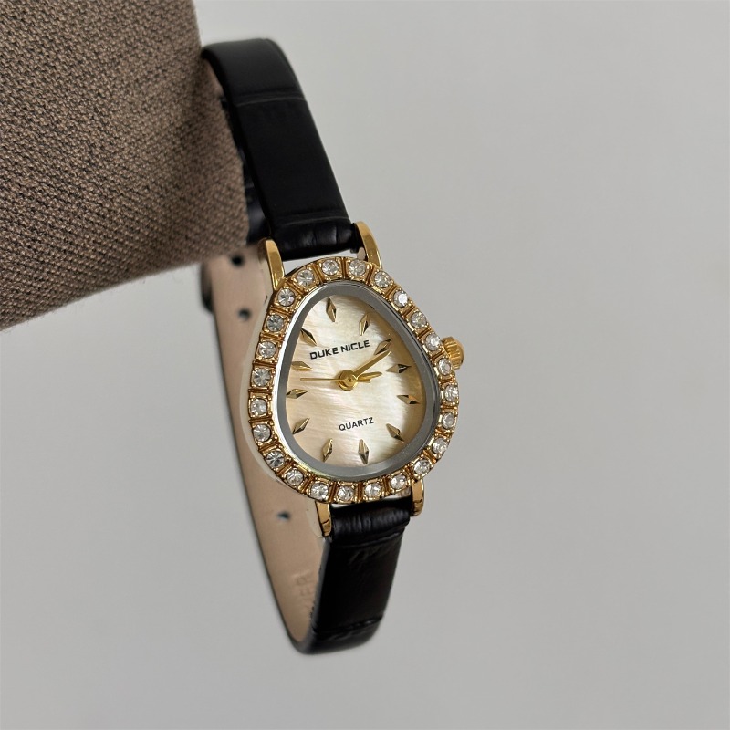 Luxury Women's Quartz Watch Go - مراجعة Luxury Watch Gold And Black وسعره