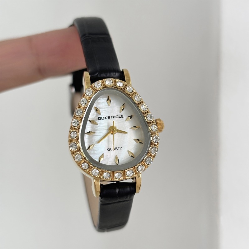 Luxury Women's Quartz Watch Go - مراجعة Luxury Watch Gold And Black وسعره