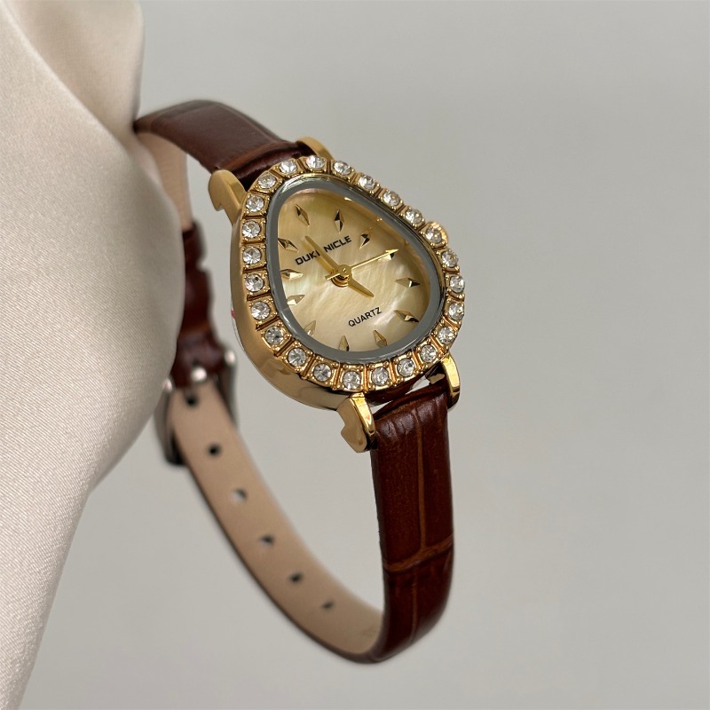 Luxury Women's Quartz Watch Go - مراجعة Luxury Watch Gold And Black وسعره